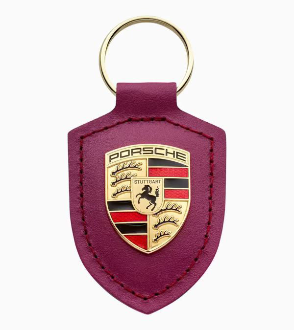 porsche | keyring | RubyStar | Metal | Leather | 75 years anniversary | from or product | Gold Porsche crest | Back of product | Driven by Dreams | Gold keyring | Special Edition | Unisex